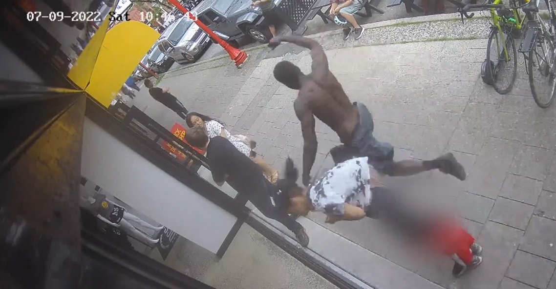 A suspect was caught on video knocking into a mother and her toddler while running from police in Vancouver.