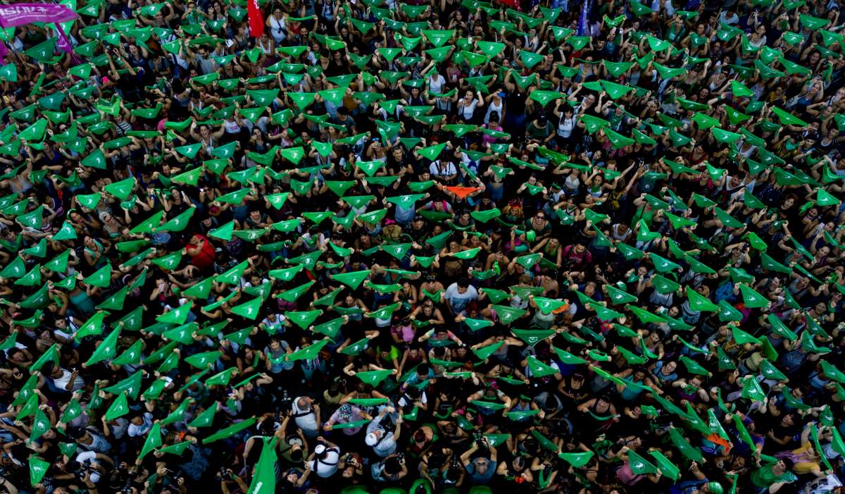 Abortion rights protesters in Argentina wear green