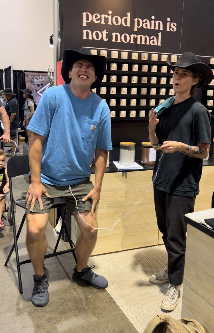 Cowboy gets buzzed with period pain simulator at Calgary Stampede. His reaction is to a level 4 pain.