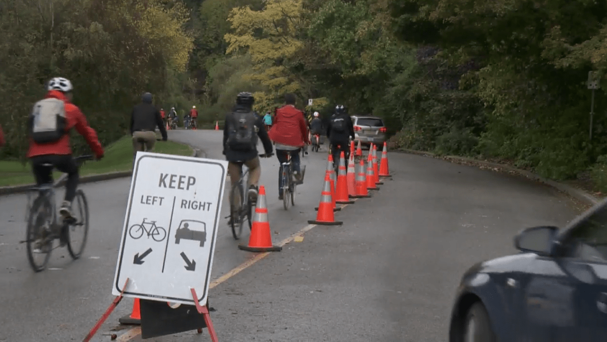 Cyclists and cars are seen using Park Drive in this undated photo.
