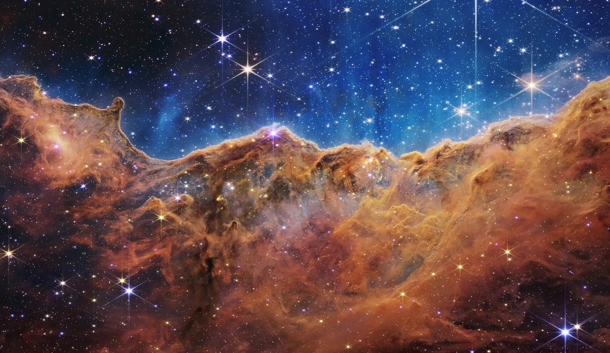 Called the Cosmic Cliffs, Webb’s seemingly three-dimensional picture looks like craggy mountains on a moonlit evening.