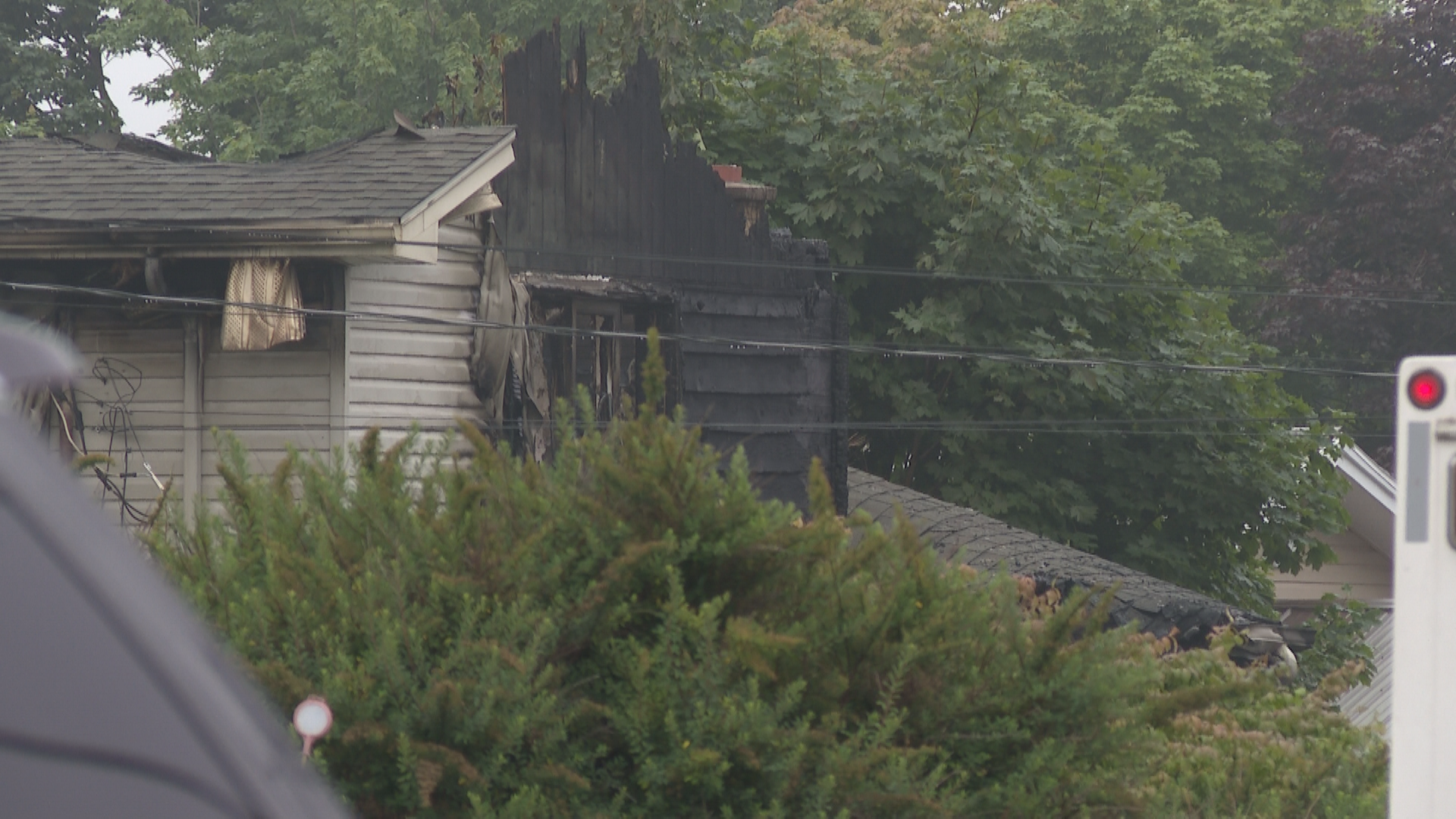Firefighters managed to get a woman out of the house but she was unresponsive.