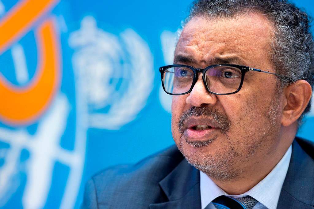 Tedros Adhanom Ghebreyesus, Director General of the World Health Organization, talks to the media in Geneva, Switzerland, Monday, Dec. 20, 2021.