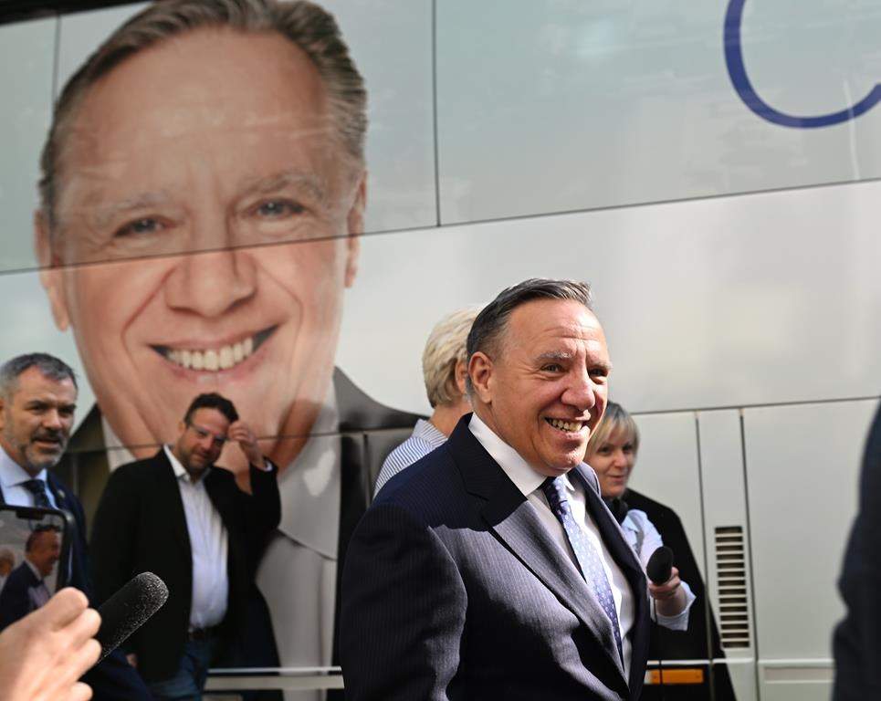 Coalition Avenir Québec Leader François Legault walks to the Lt.-Gov.’s office to call a general election, Sunday, Aug. 28, 2022, in Quebec City. Quebecers are going to the polls for a general election on Oct. 3. THE CANADIAN PRESS/Jacques Boissinot