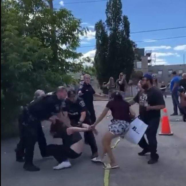 Peterborough police attempt to arrest followers of Romana Didulo on Aug. 13, 2022.