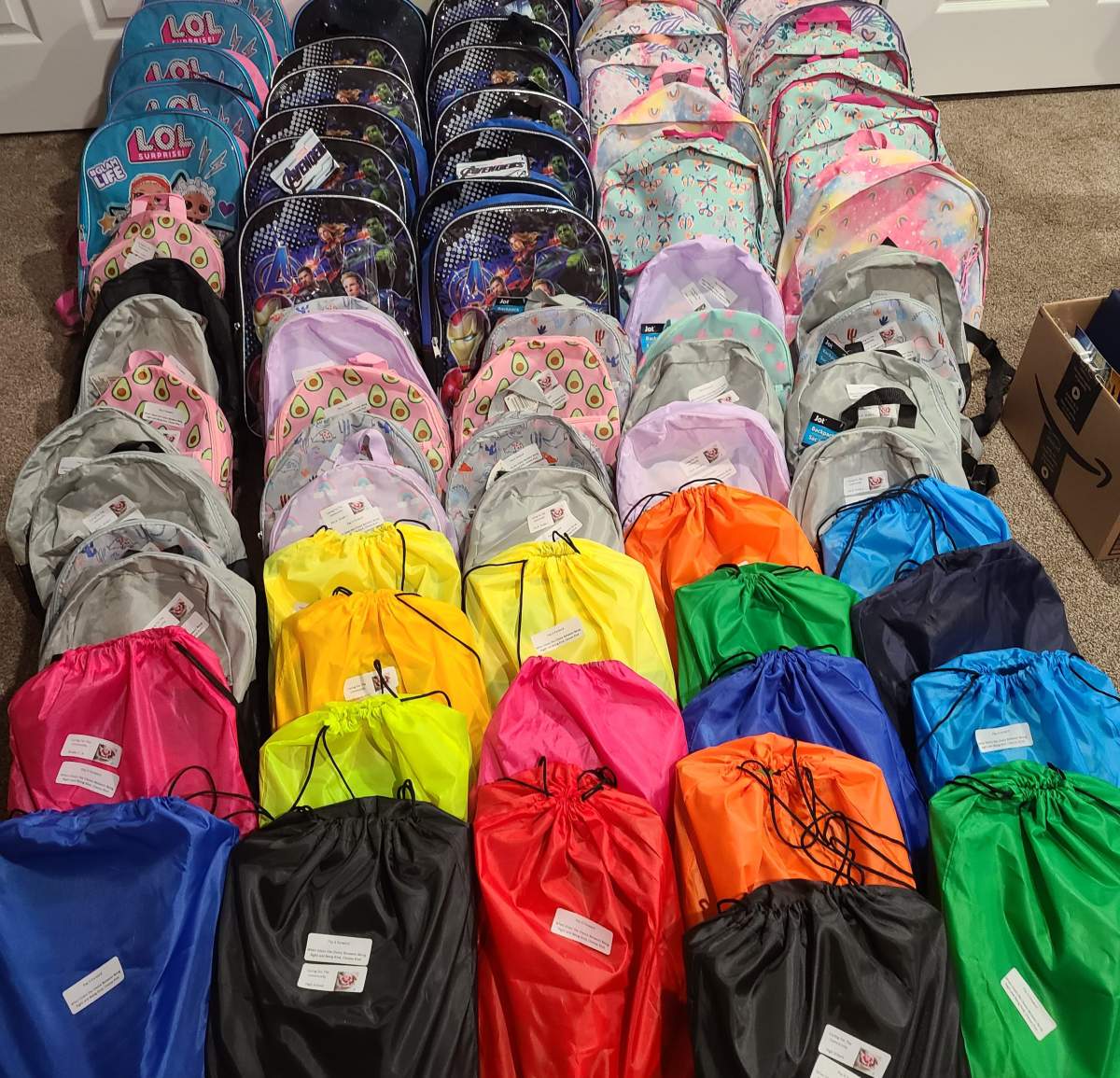 A Regina family makes it an August tradition to volunteer their time to gather school supplies and backpacks to give away to kids in need. 
