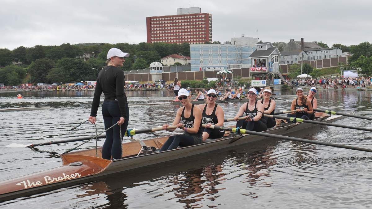 Members of the Studio Verso team celebrate after racing to victory in the women’s long course event at the Royal St. John’s Regatta in St. John’s, Thursday, August 4, 2022. Four crews of women rowers made history in a race from one end of Quidi Vidi Lake to the other along a course historically reserved for men. THE CANADIAN PRESS/Bud Gaulton