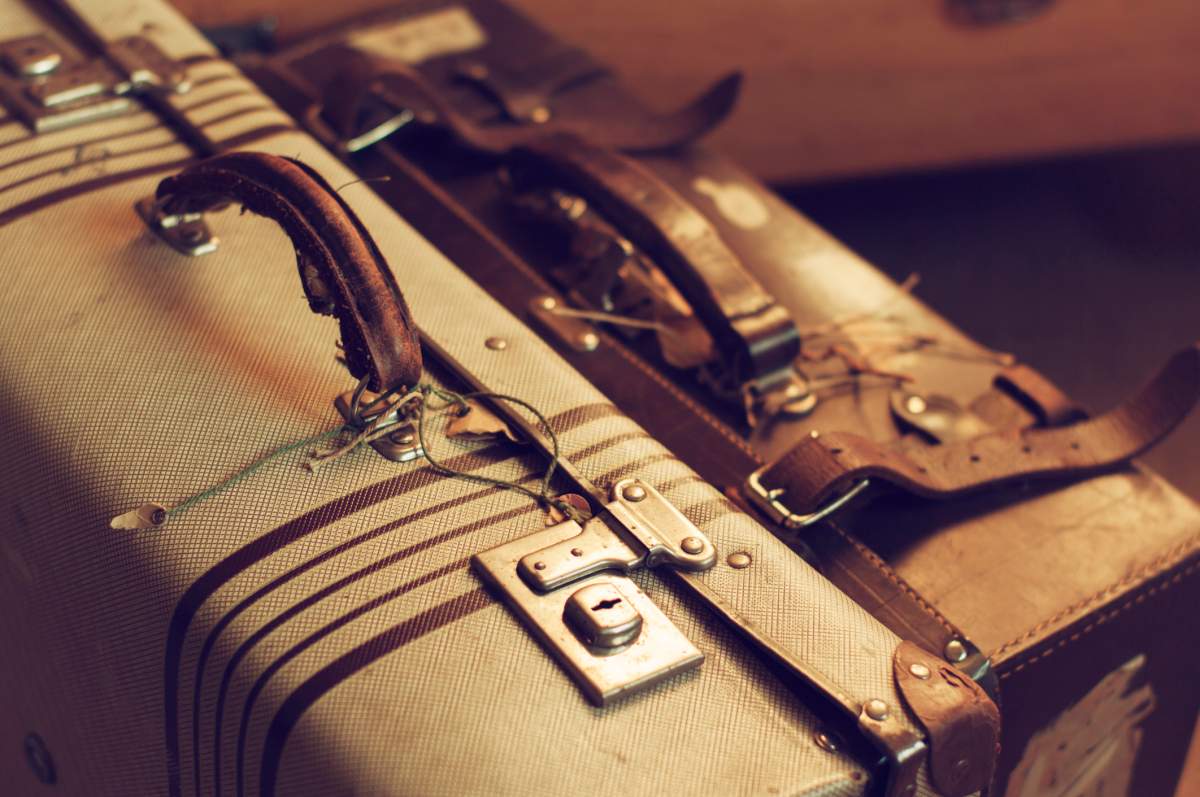 Two vintage suitcases are shown in this photo illustration.