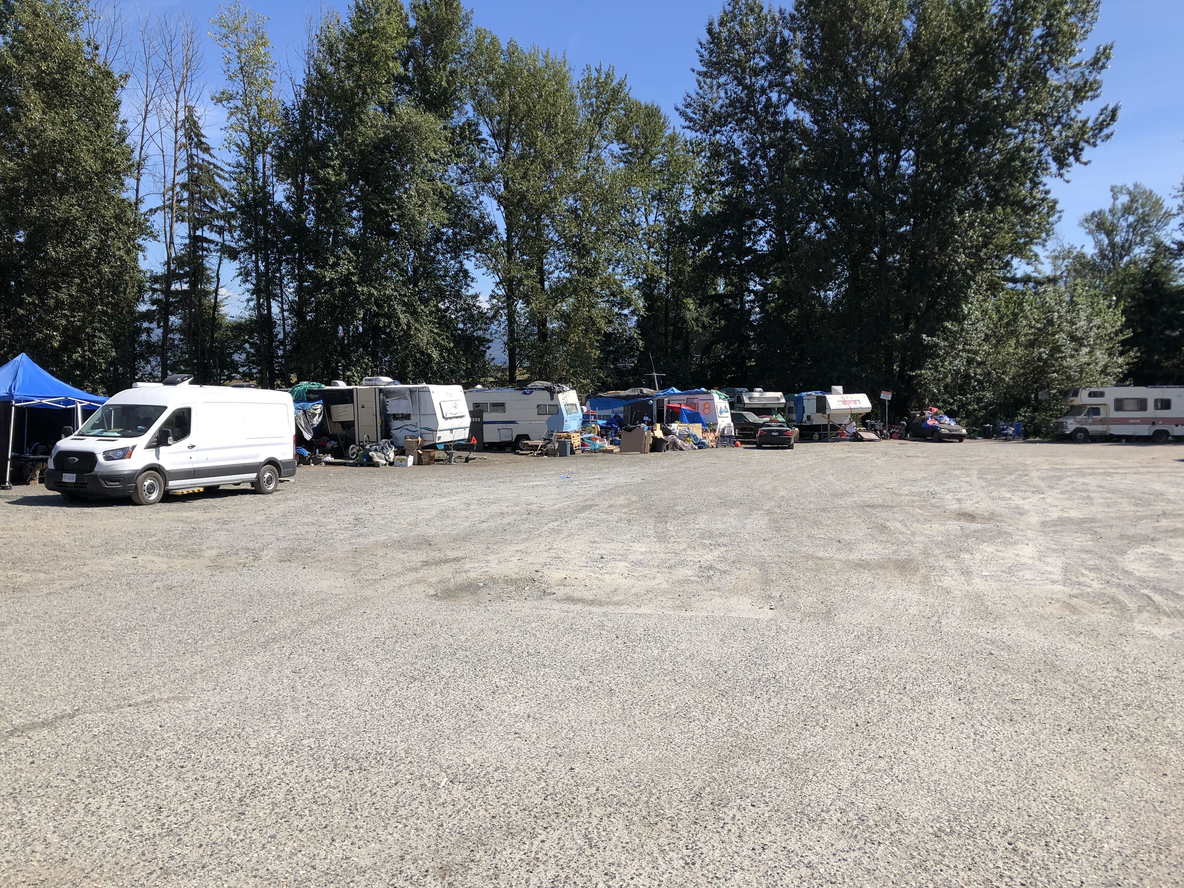 Old trailers and motorhomes are exposed to the elements in an encampment along the eastern edge of Abbotsford, B.C.
