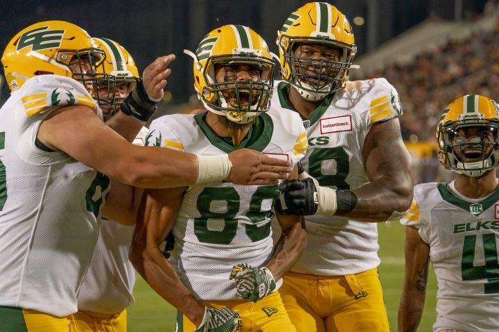 Edmonton Elks wide receiver Kenny Lawler (89) celebrates his touchdown that brought his team within one point of the Hamilton Tiger Cats late in the during fourth quarter of CFL football game action in Hamilton, Ont., Friday, July 1, 2022. 