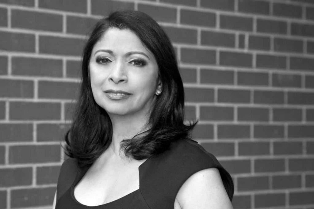 Linda Nazareth appears in a black and white headshot