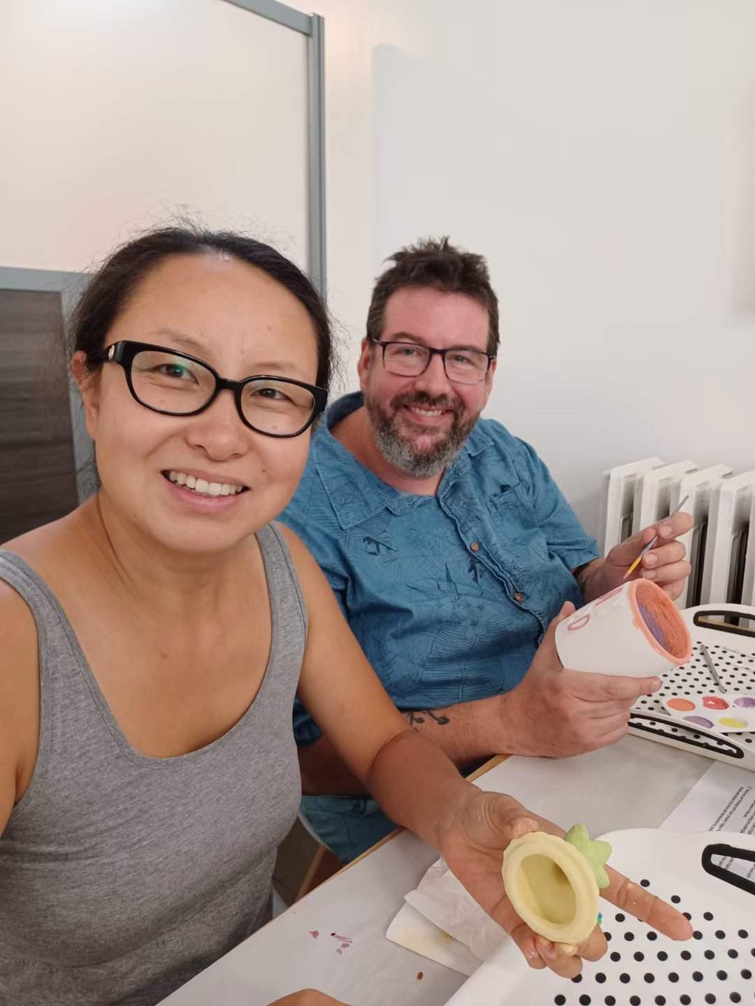 Simon McNeil and his wife, Pam Han