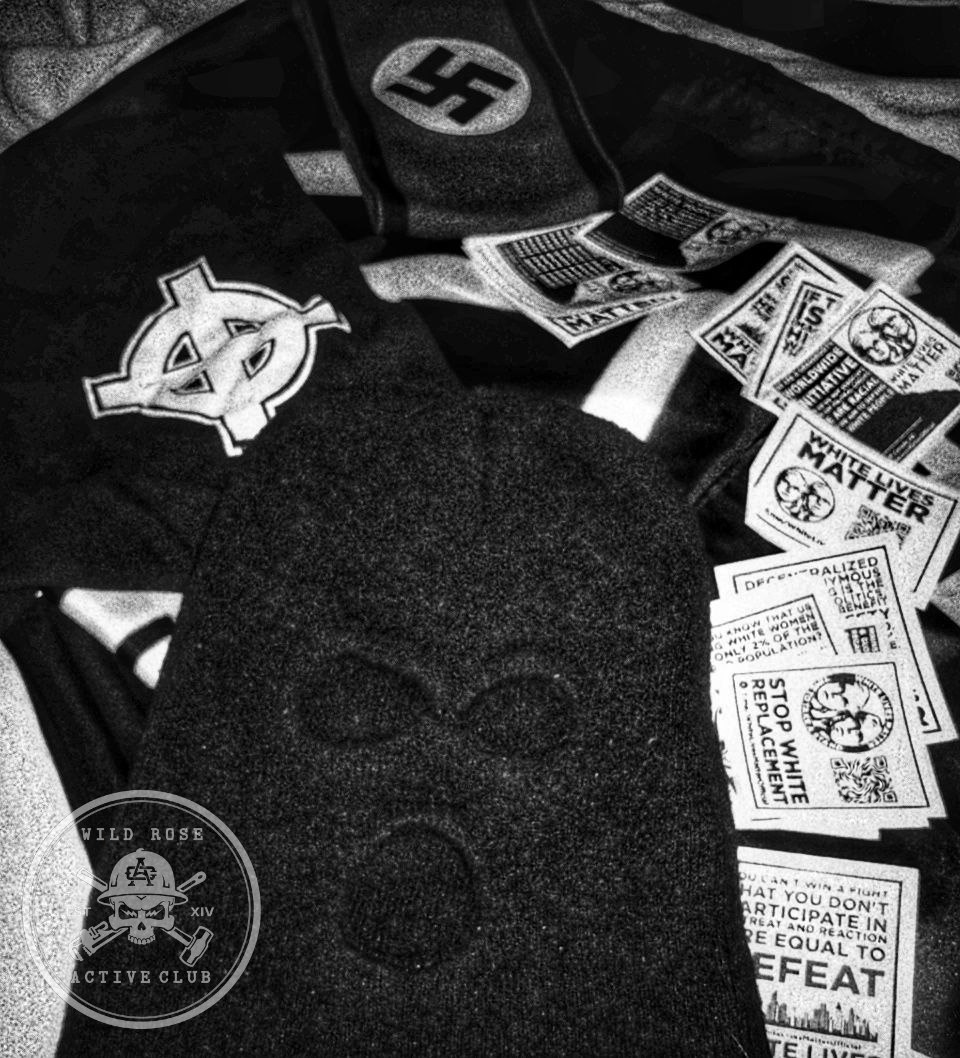 An image posted by Wild Rose active club on May 10 to social media, picturing white supremacist propaganda, a Nazi armband and a balaclava.