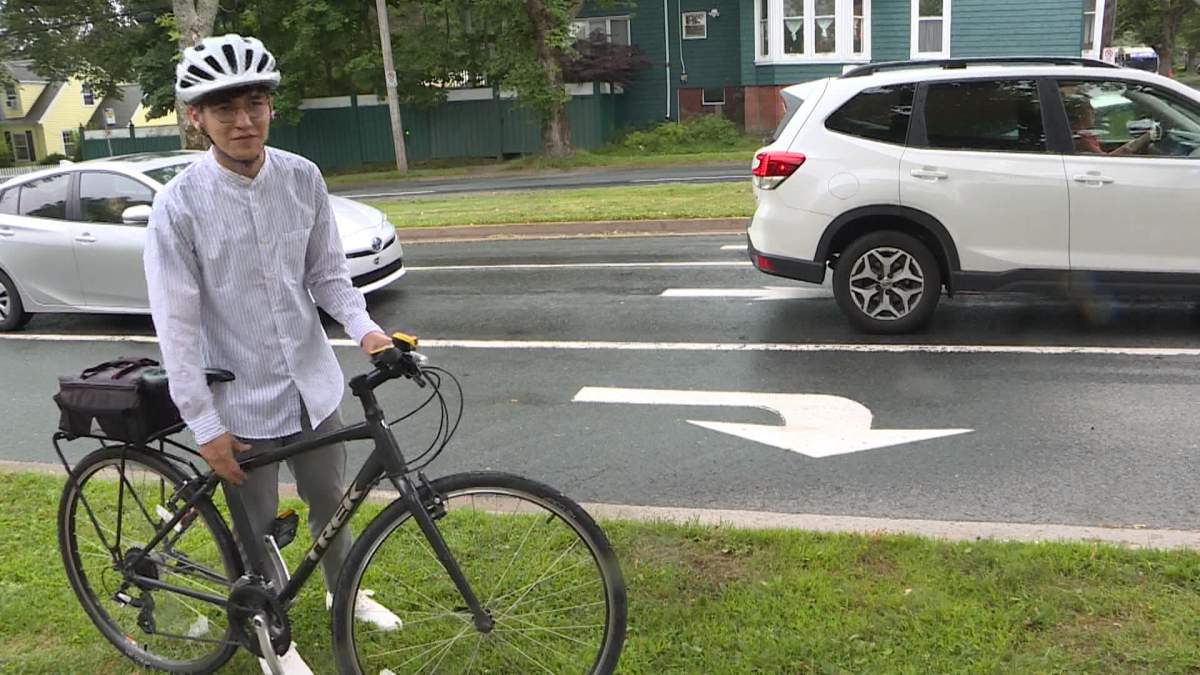 Cyclist Ben MacLeod gets ready to ride his bike on Robie Street.