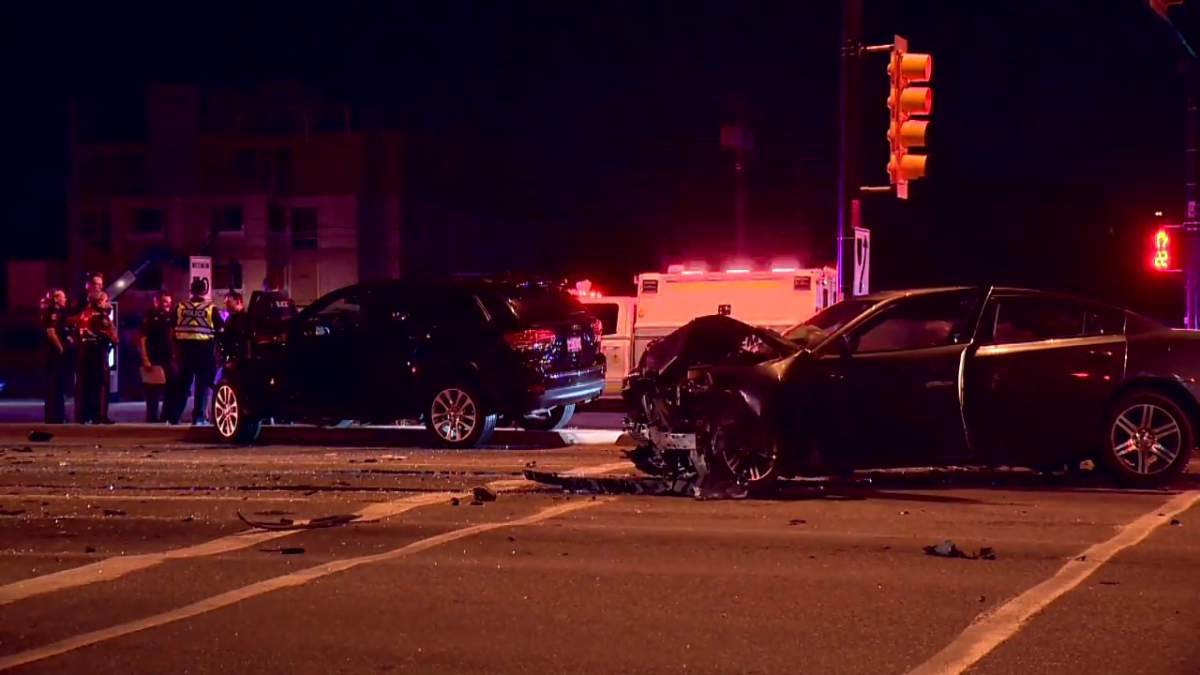 Calgary police investigate a serious crash between three vehicles at the intersection of 16 Avenue Northeast and Edmonton Trail Northeast on Aug. 26, 2022.