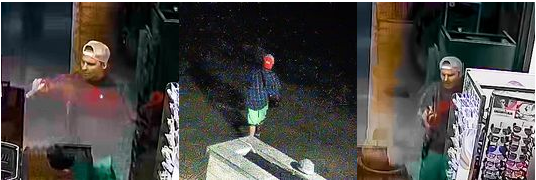 A surveillance image of a man suspected of painting hate symbols on multiple Winnipeg businesses.
