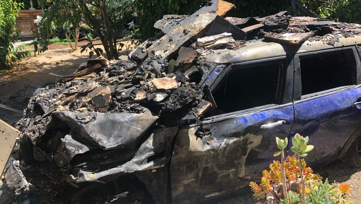 The destroyed car driven by Anne Heche in the crash.