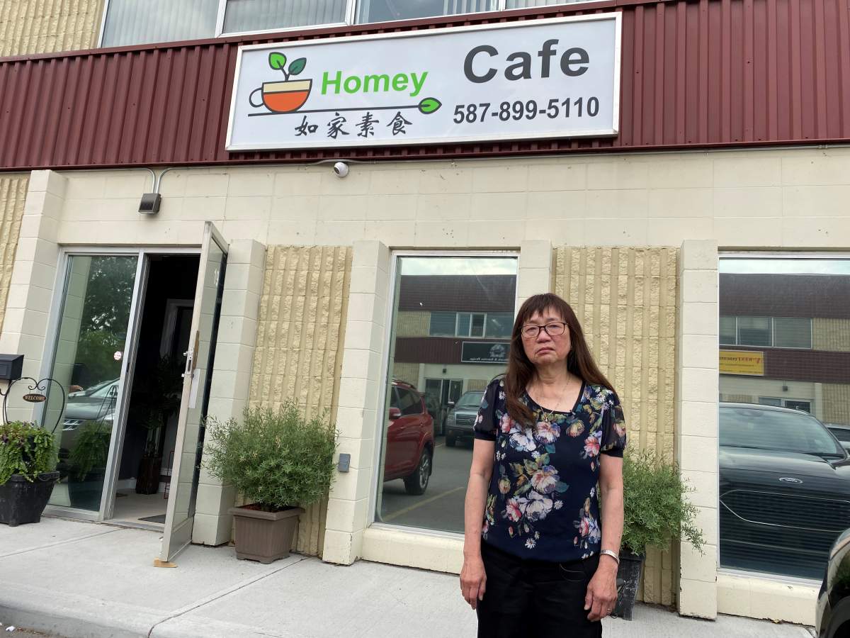 Christina Lo stands outside her cafe