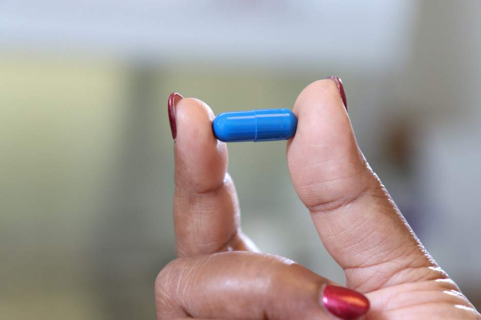 A fecal microbiota transplantation capsule for C. difficile treatment being held by Lawson Health Research Institute's Seema Nair Parvathy. Officials with St. Joseph's Health Care London say the capsule is opaque and does not smell.