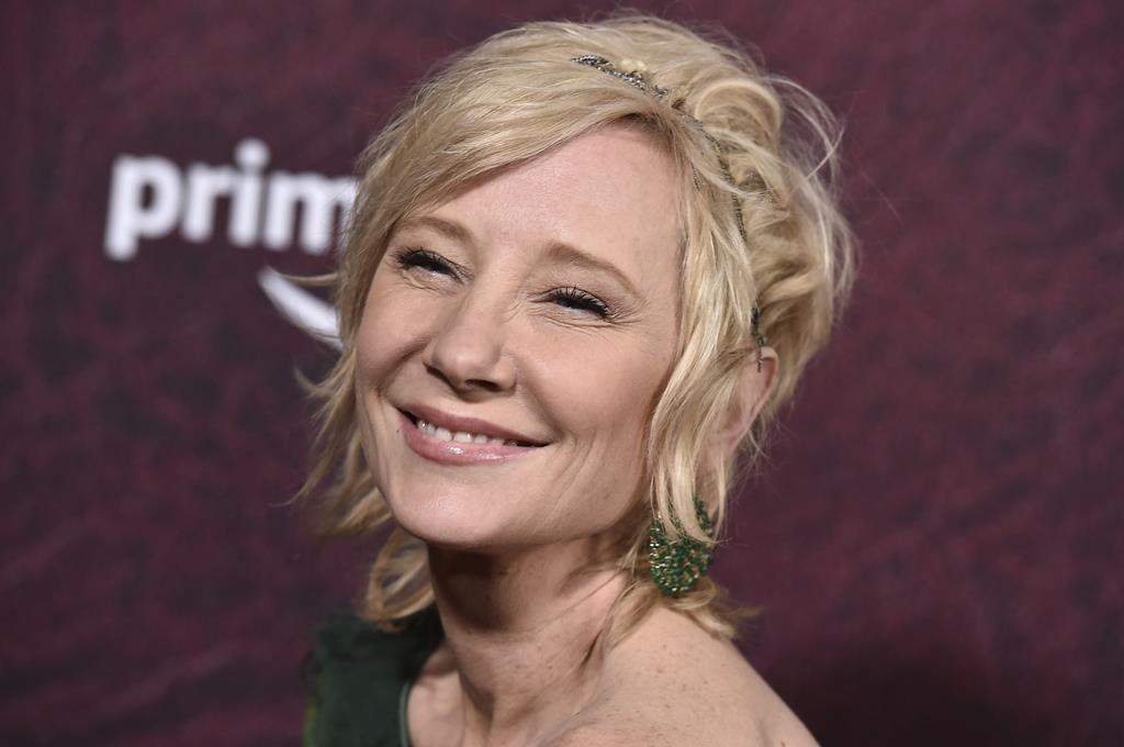 Anne Heche arrives at the premiere of "The Tender Bar" at the TCL Chinese Theatre, on Dec. 12, 2021, in Los Angeles.