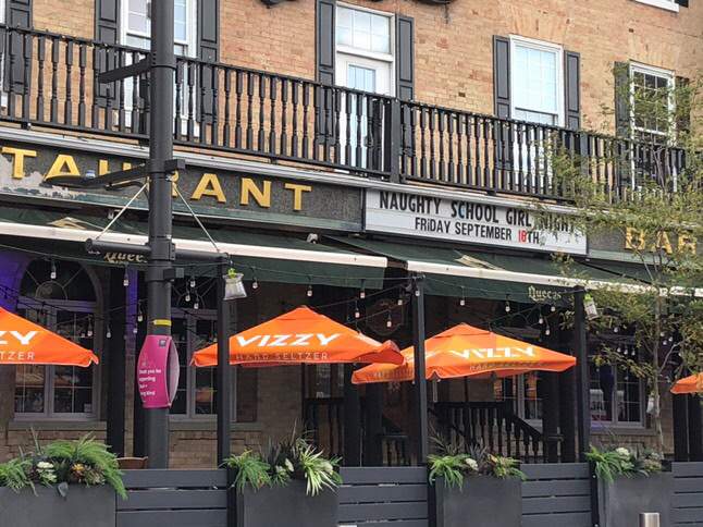 The sign outside the Queens Hotel/Queens Nightclub in Barrie Ont., promoting 'Naughty School Girl Night.'.