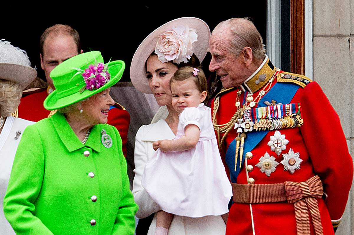 Duchess of Cambridge with Princess Charlotte, Queen Elizabeth II, Duke of Edinburgh on the balcony of Buckingham Palace in 2016.