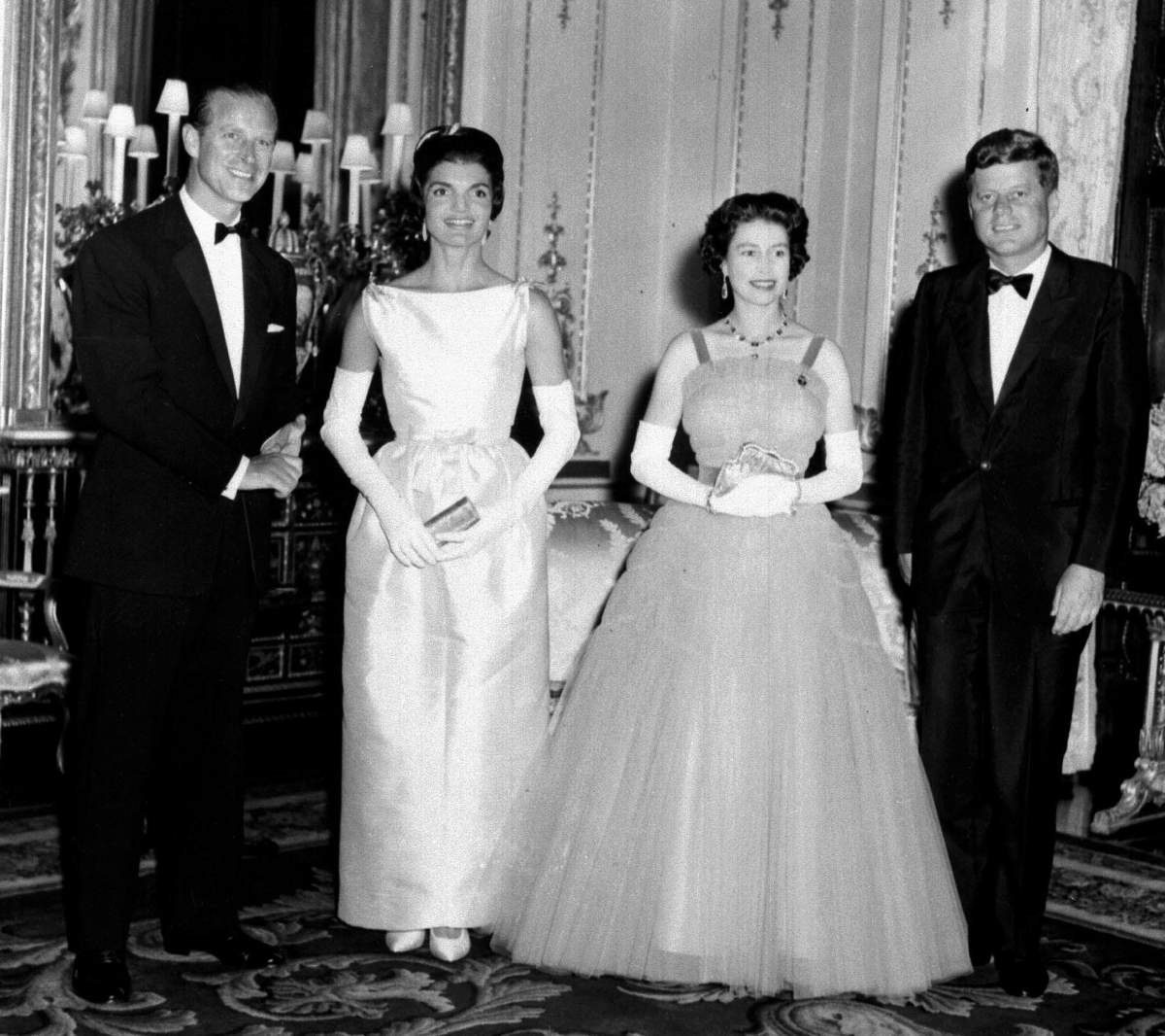Duke of Edinburgh, the then First Lady Jacqueline Kennedy, Queen Elizabeth II and the then U.S. President John F. Kennedy at Buckingham Palace in 1961.