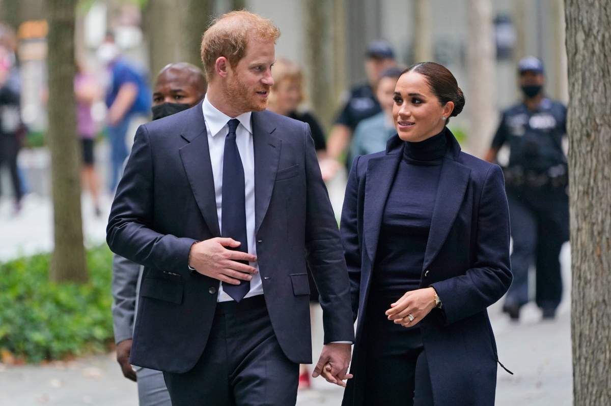 Meghan Markle and Prince Harry leave the National September 11 Memorial & Museum in New York, Thursday, Sept. 23, 2021.