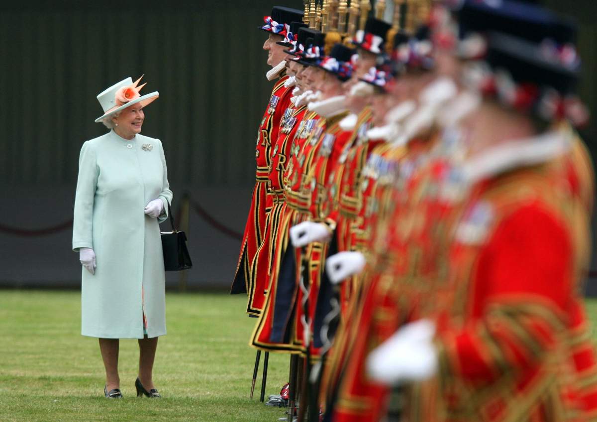 Queen Elizabeth II smiles as she inspects the Queen's Body Guard of the Yeomen of the Guard at Buckingham Palace in central London in 2007.