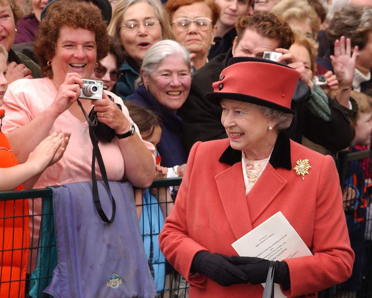 Queen Elizabeth II meets the public on a walkabout as she leaves Christ Church Cathedral in Victoria, B.C., after attending a Sunday church service Sunday 6th October 2002. (PA Photo: Kirsty Wigglesworth)