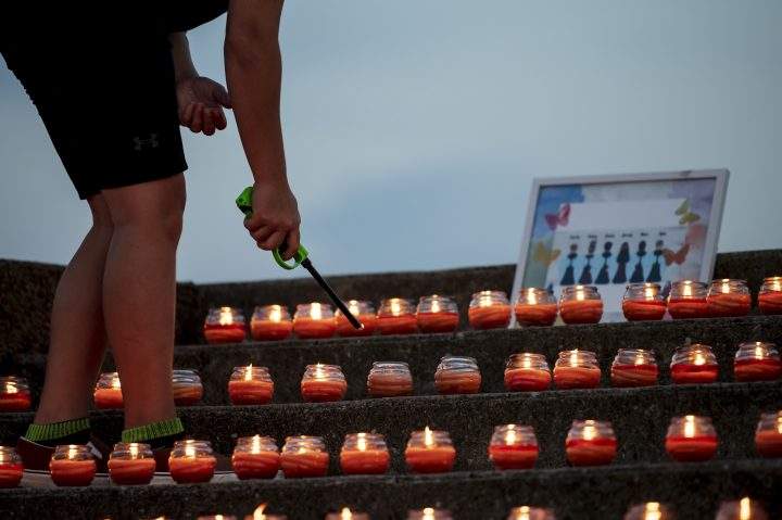 Candles are lit at vigil for six young people killed in a car accident in Barrie, Ont. on Saturday, September 3, 2022.  