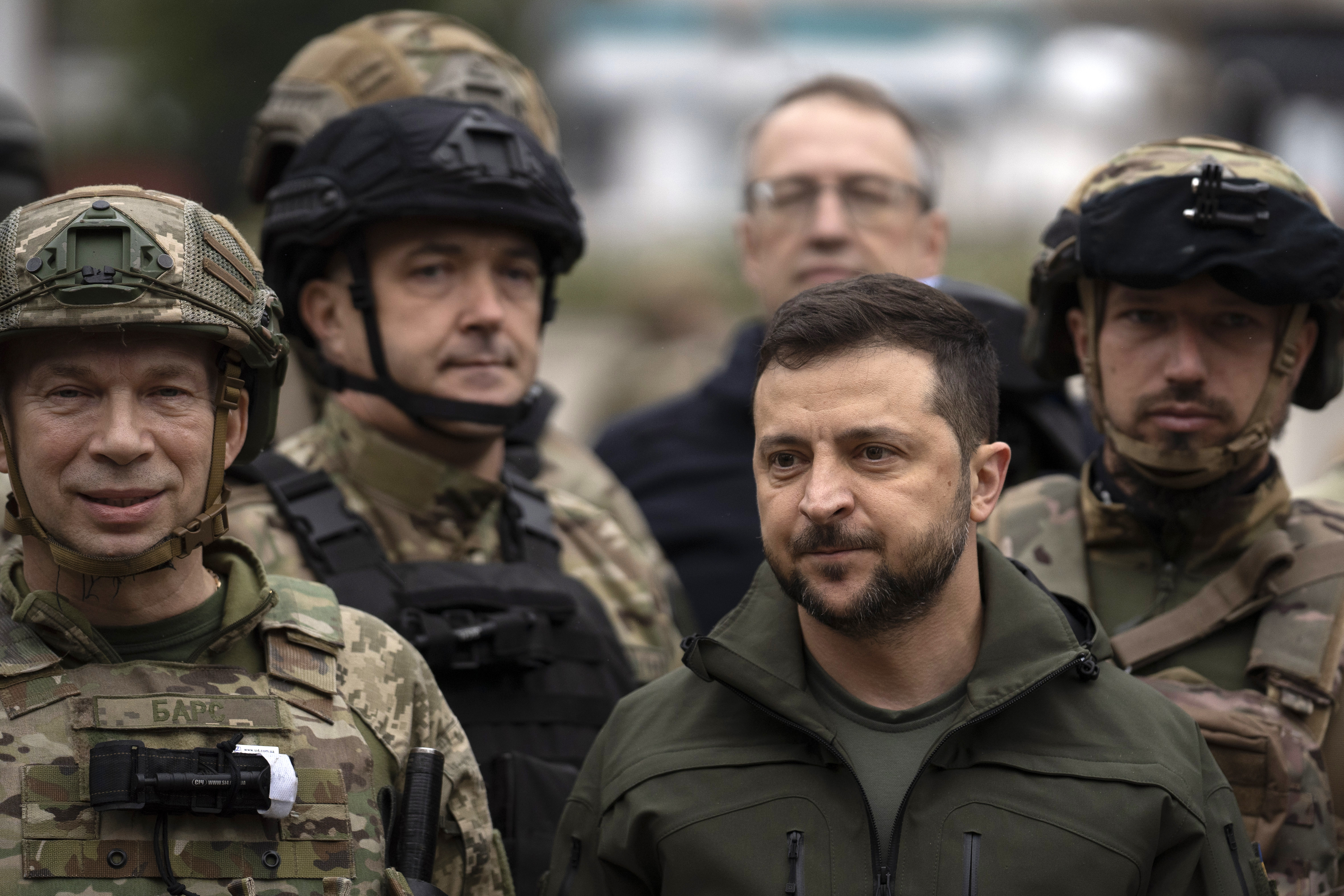 President Volodymyr Zelenskyy with soldiers in Izium, after the city in Kharkiv region was liberated. Roshel’s vehicles are being used by Ukrainian soldiers in the region.