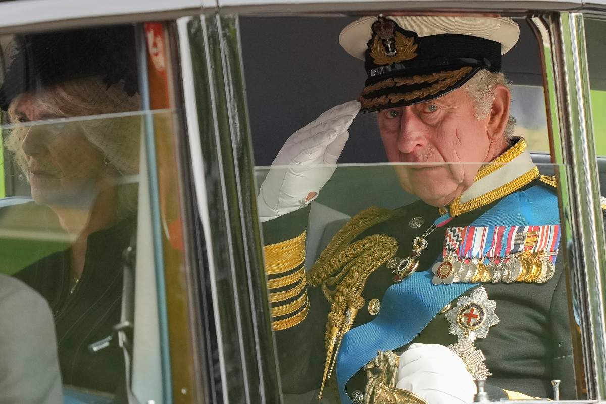 King Charles III salutes as he leaves Westminster Abbey following the state funeral service of Queen Elizabeth II in Westminster Abbey in central London Monday Sept. 19, 2022.  (AP Photo/Martin Meissner, Pool)