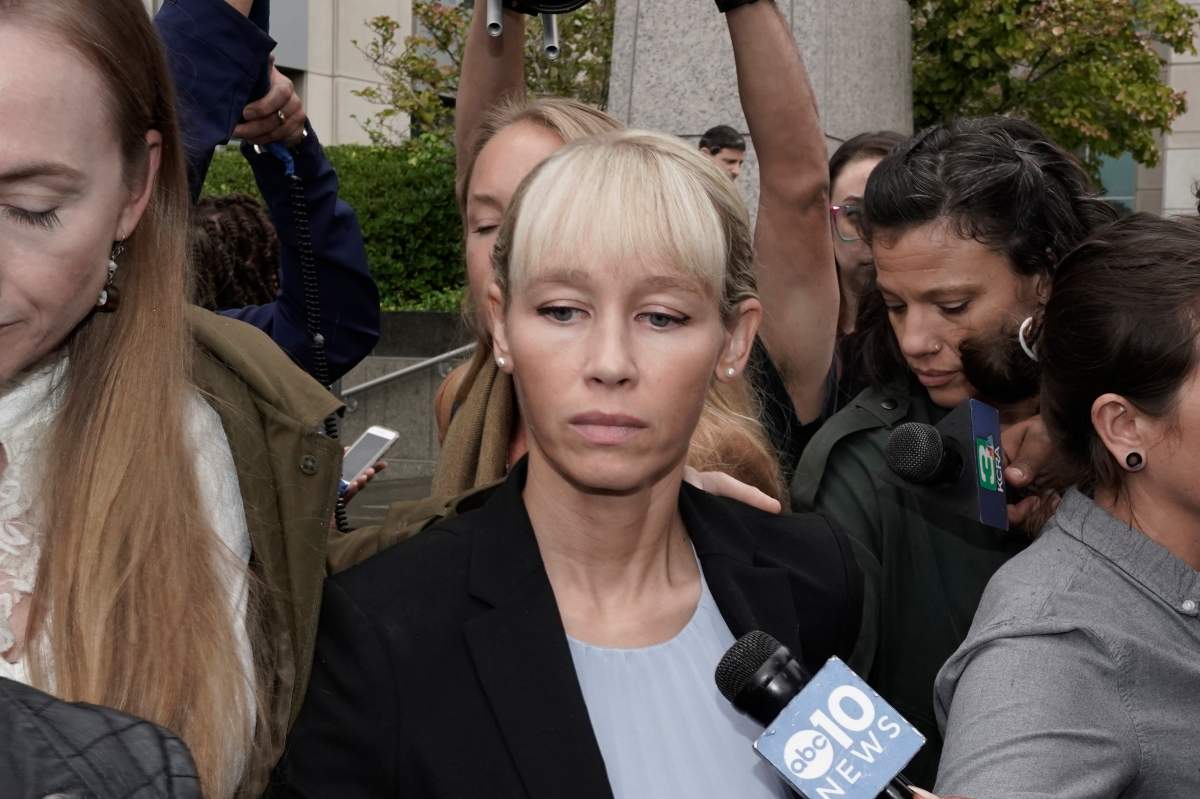 Sherri Papini leaves the federal courthouse after Federal Judge William Shubb sentenced her to 18 months in federal prison, in Sacramento, Calif., Monday, Sept. 19, 2022. Federal prosecutors had asked that she be sentenced to eight months in prison for faking her own kidnapping in 2016.