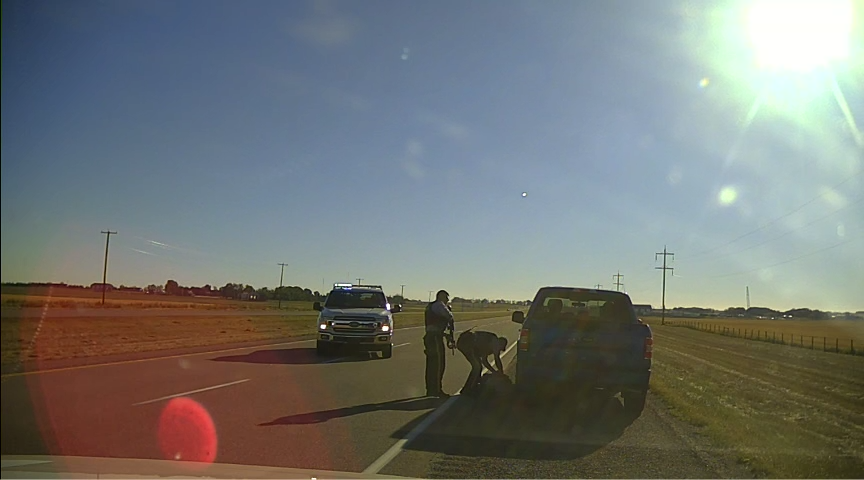 Strathmore RCMP officers are seen in conducting a high risk traffic stop on Sept. 10, 2022, following reports of road rage that included the flashing of a handgun.