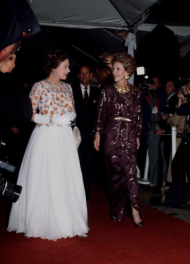 Queen Elizabeth ll and Nancy Reagan arrive for a concert during an official tour of the U.S.A. on February 28, 1983 in Long Beach, USA.