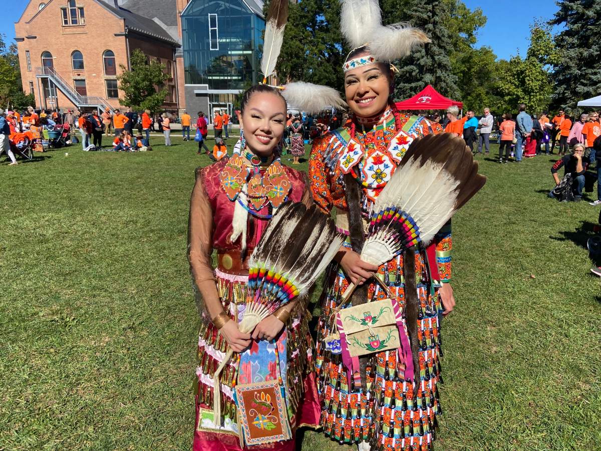 Jingle dress dancers Debwaywin and Tahlalmna Miskokowa on Sept. 30, 2022.