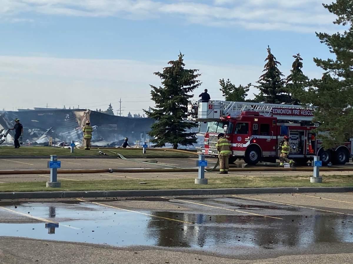 Fire crews battle blaze at a building in the area of 95 Avenue and 49 Street Monday, Sept. 12, 2022.