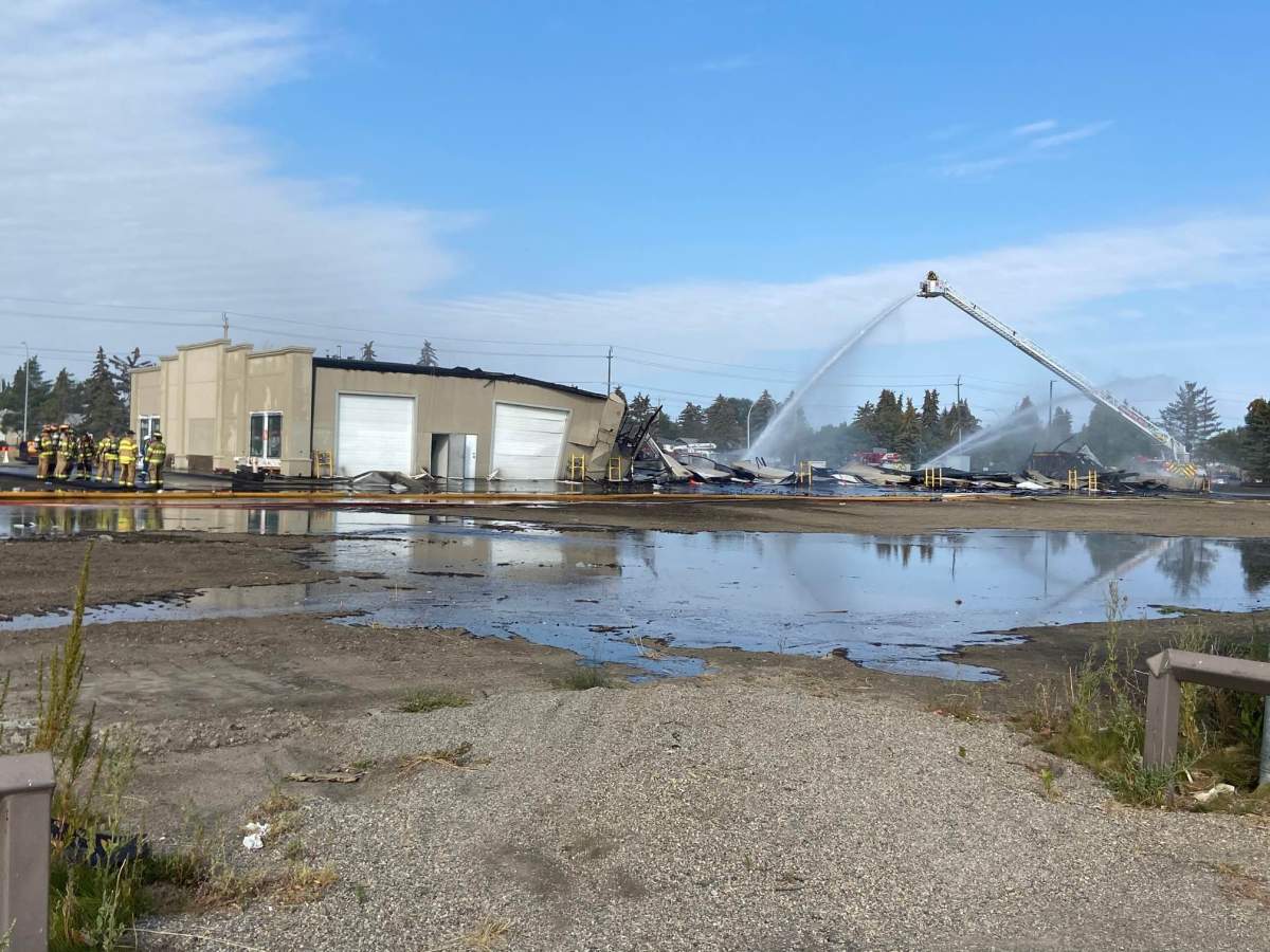 Fire crews battle blaze at a building in the area of 95 Avenue and 49 Street Monday, Sept. 12, 2022.
