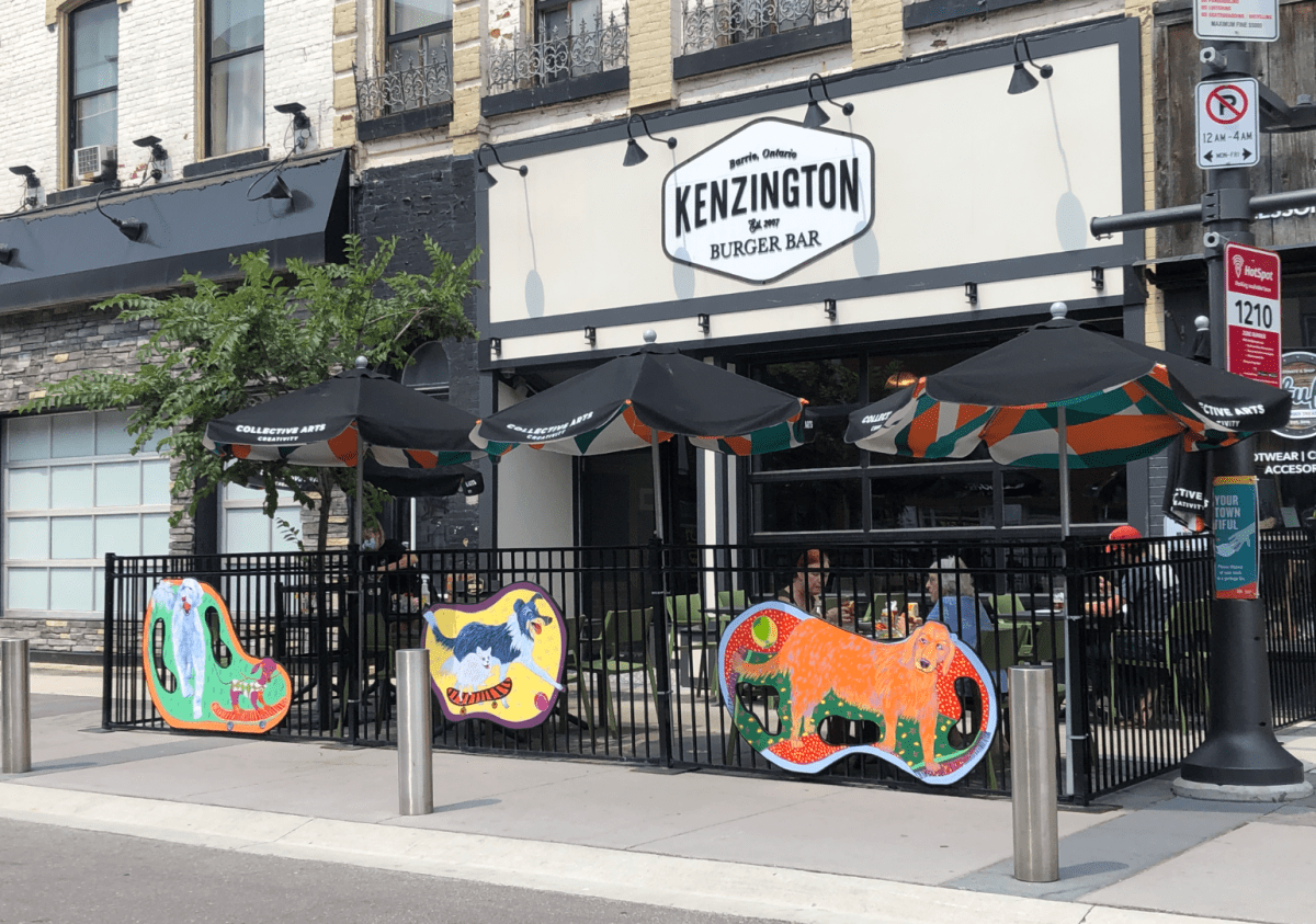 It’s a Dog’s Life by Christina Luck outside Kenzington Burger Bar, 40 Dunlop St. E. in Barrie, Ont.