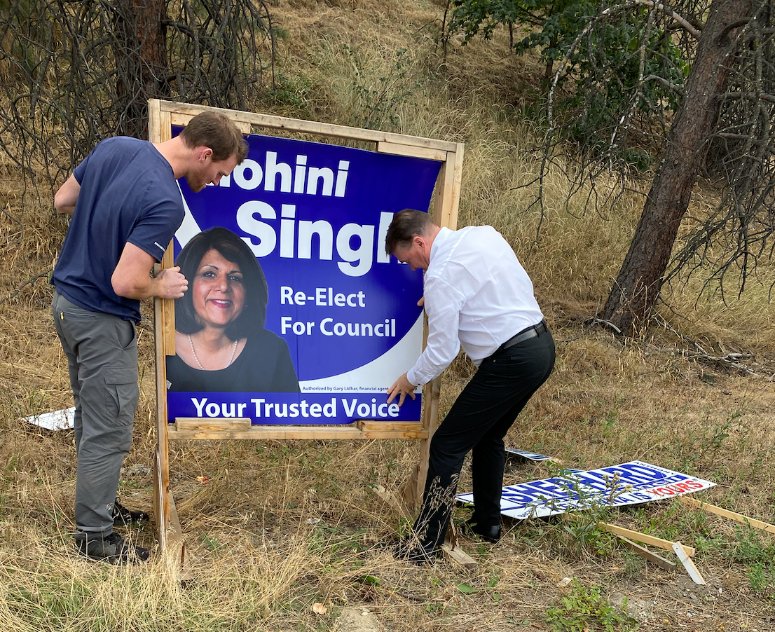 A destroyed campaign sign for councilor candidates Mohini Singh and Anthony Shephard.