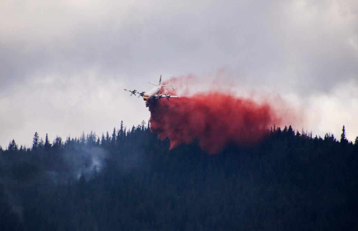 Government of Alberta airtankers dropping fire retardant on the Chetamon wildfire in Jasper National Park in Sept. 8, 2022.