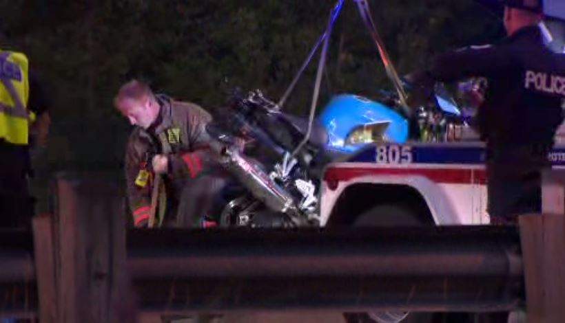 Police towing the motorcycle involved in a crash on the DVP on Sept. 16, 2022.