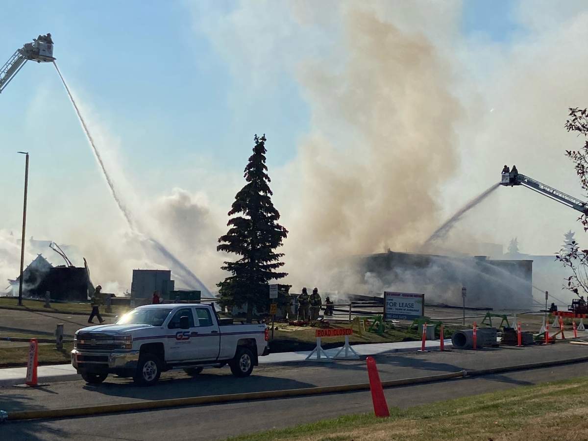 Fire crews battle blaze at a building in the area of 95 Avenue and 49 Street Monday, Sept. 12, 2022.