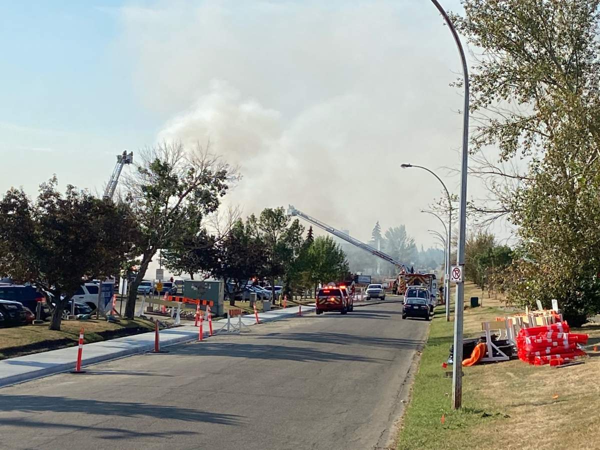 Fire crews battle blaze at a building in the area of 95 Avenue and 49 Street Monday, Sept. 12, 2022.