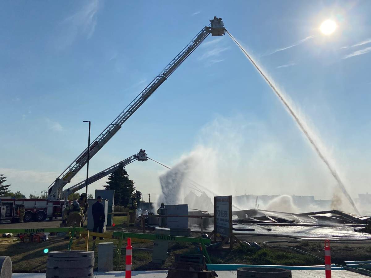 Fire crews battle blaze at a building in the area of 95 Avenue and 49 Street Monday, Sept. 12, 2022.