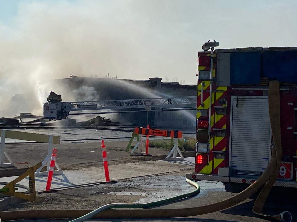 Fire crews battle blaze at a building in the area of 95 Avenue and 49 Street Monday, Sept. 12, 2022.