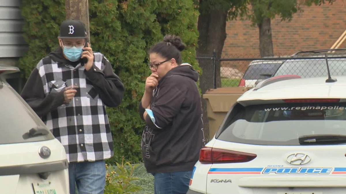 Worried family members await news outside of F.W. Collegiate.