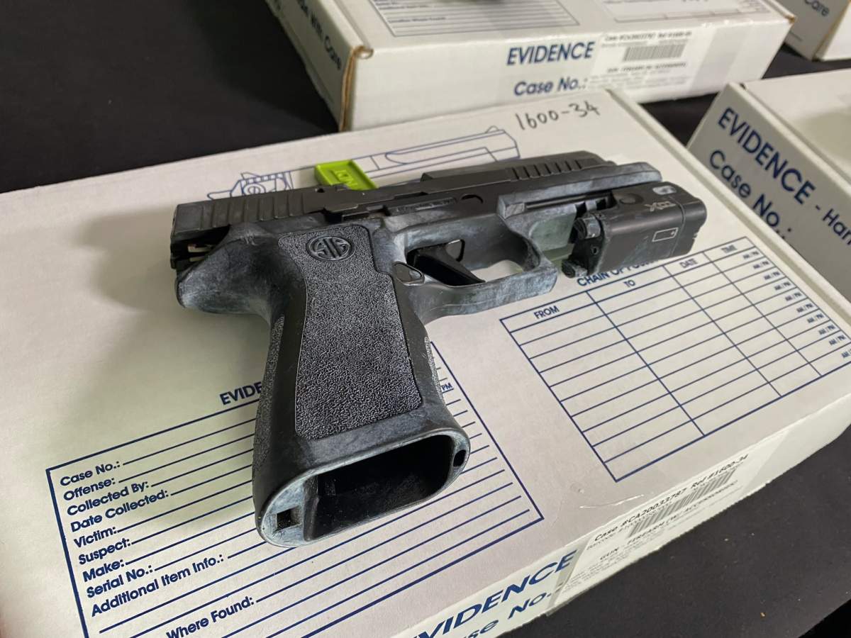 A total of 19 firearms including handguns, rifles, submachine guns and suppressors were taken off the street as a result of Project Cobra and were shown at a news conference on Sept. 28, 2022.