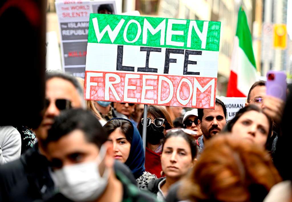 Members of the Iranian community rally in solidarity with protesters in Iran, after 22-year-old Mahsa Amini died in police custody for allegedly improperly wearing a hijab, Ottawa Sept. 25, 2022.